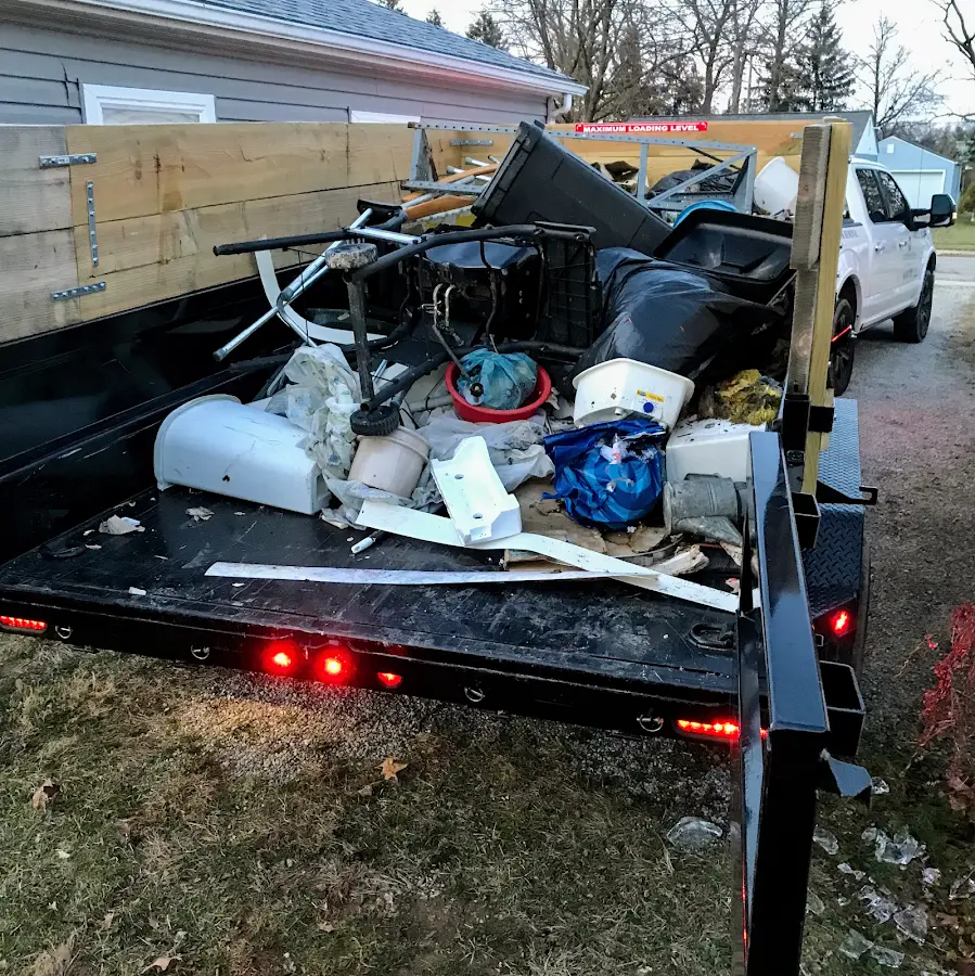 Roll-off dumpster delivered to a residential driveway in Greenbriar